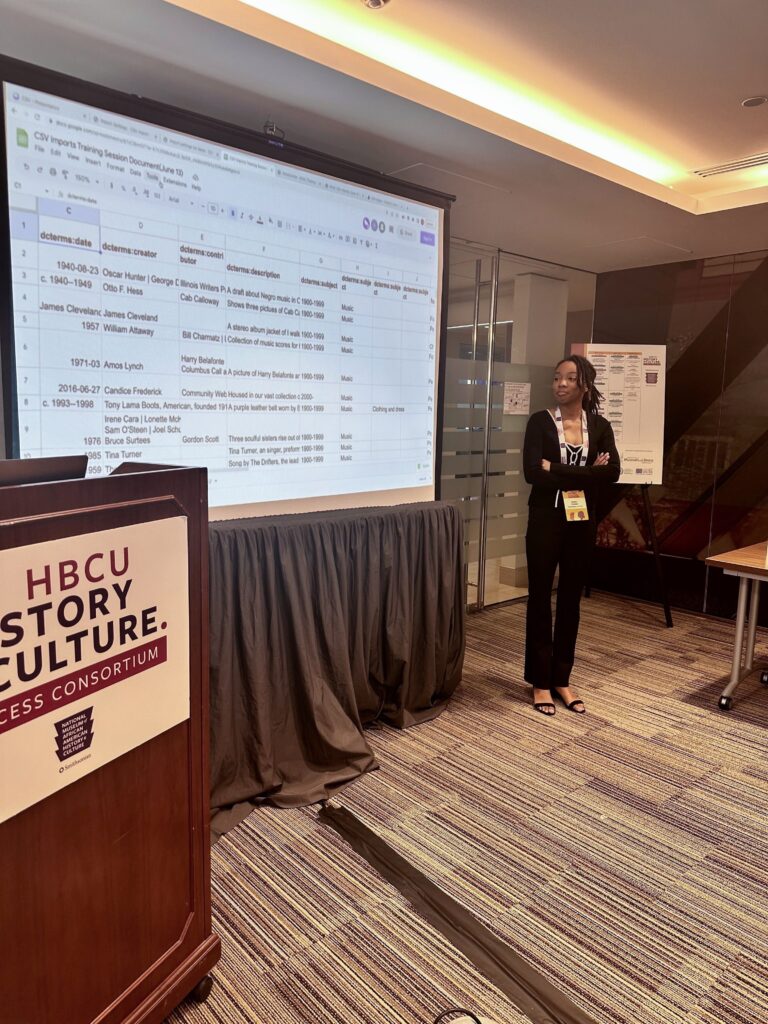 PhD student Amber Pelham presenting a portion of Omeka S training at the HCAC convening in June.